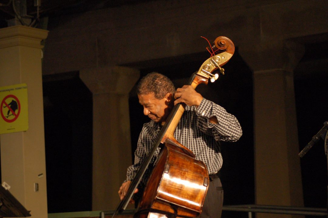a man playing double bass